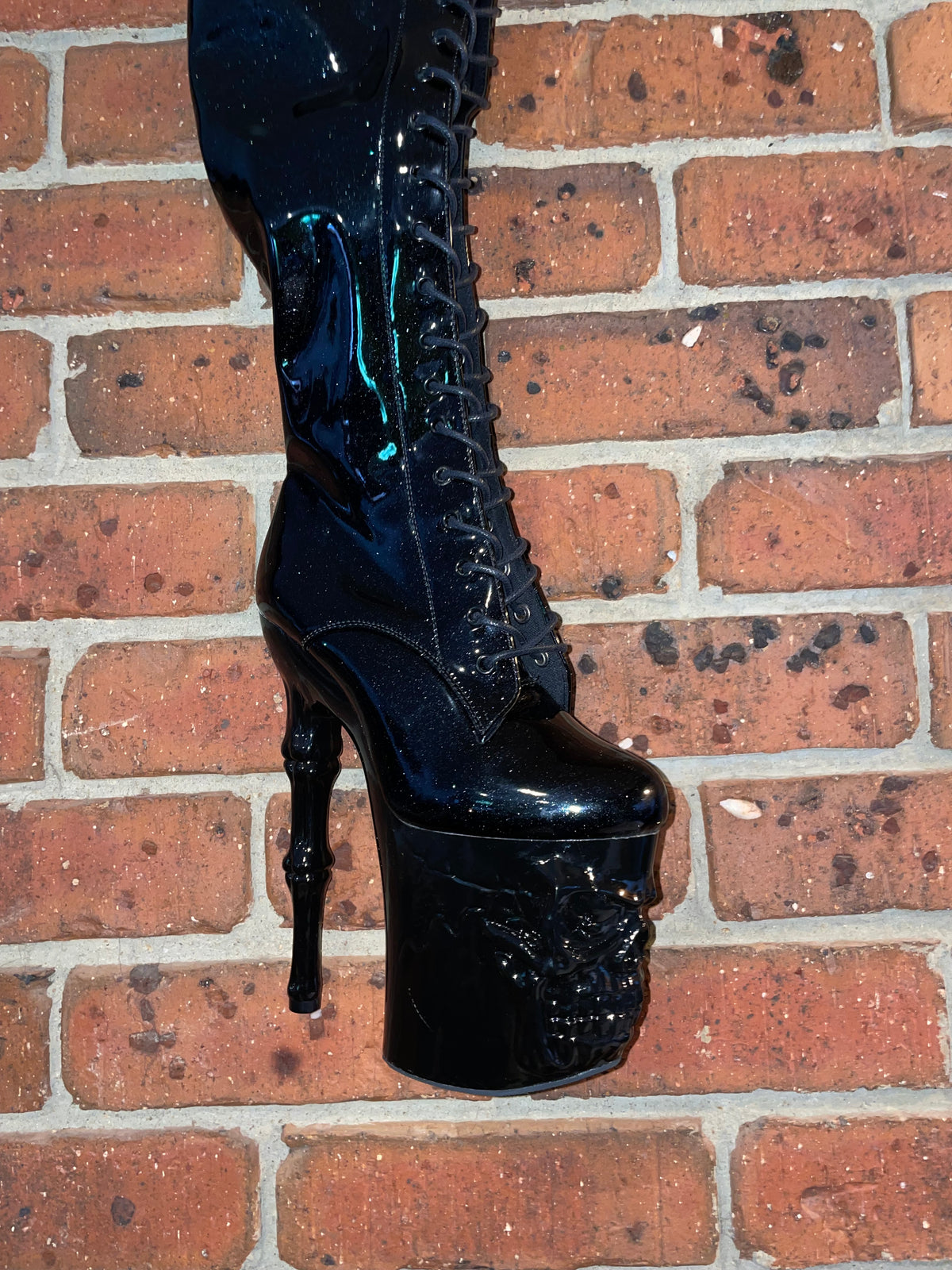 Skull platform glitter thigh high boots with knee pads